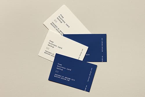 Few business cards lying on paper mockup