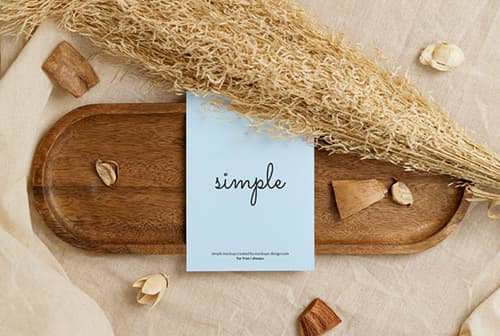 Free A6 flyer on wooden tray mockup