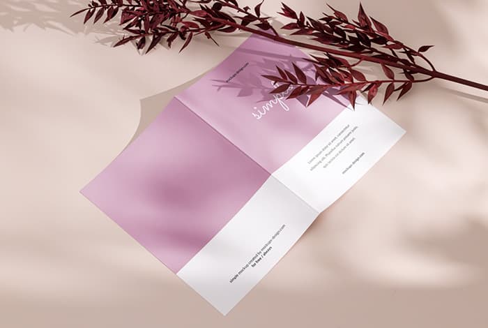 Bifold flyer with red plant mockup