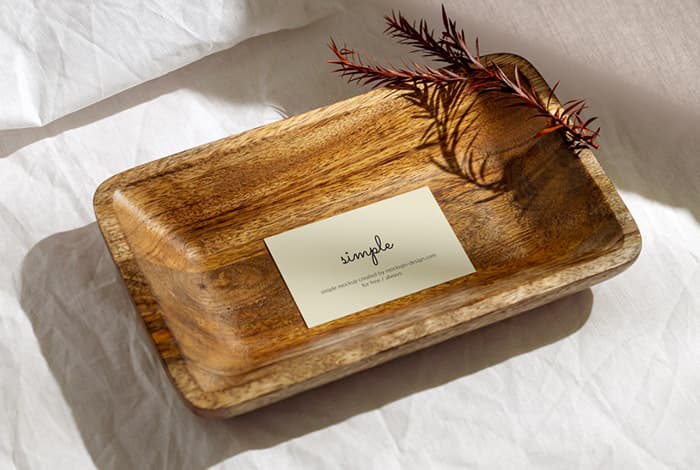 Business card in wooden bowl mockup