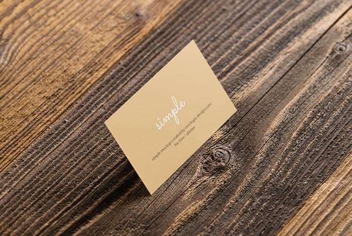 Business card on wooden planks mockup
