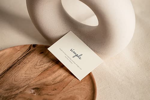Business card on wooden tray mockup