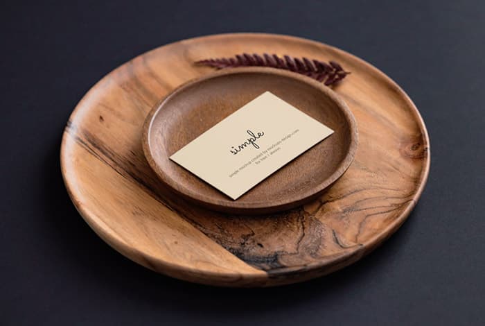 Single business card on black background mockup