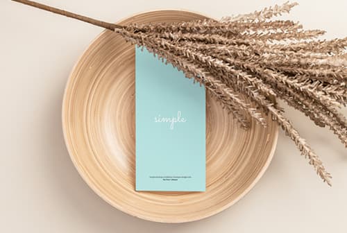 DL flyer in a wooden bowl mockup