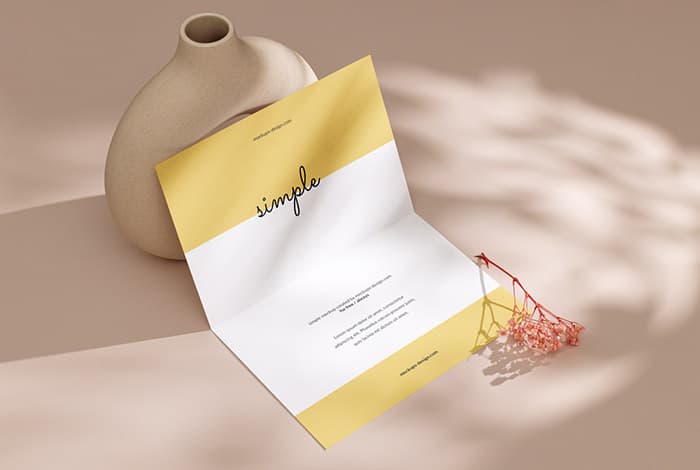 Bi fold flyer with a flowerpot mockup