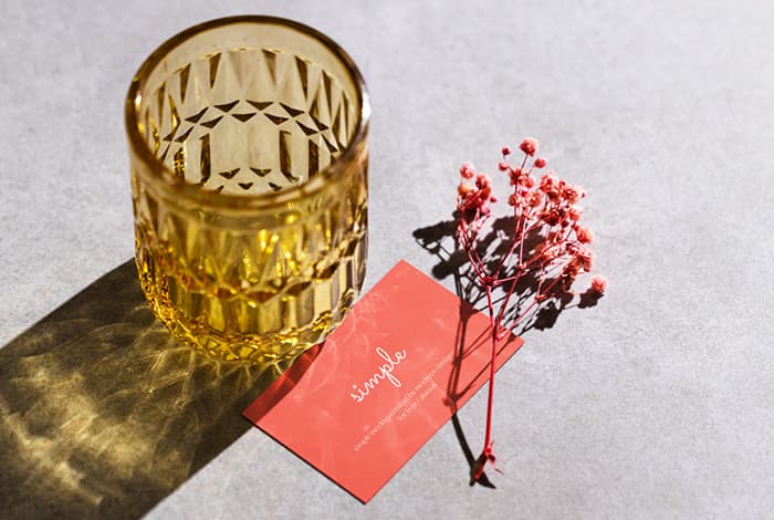 Free business card with glass vase mockup