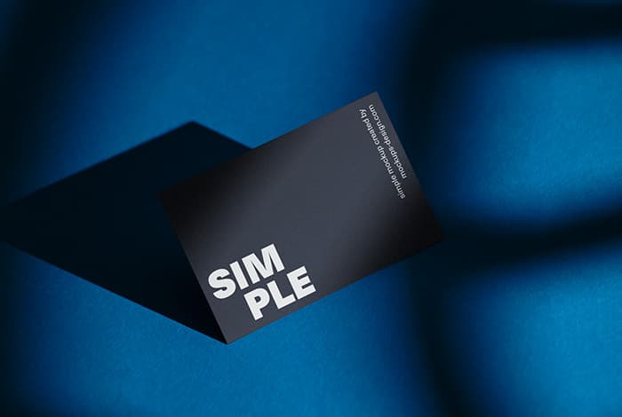 Business card on blue background mockup