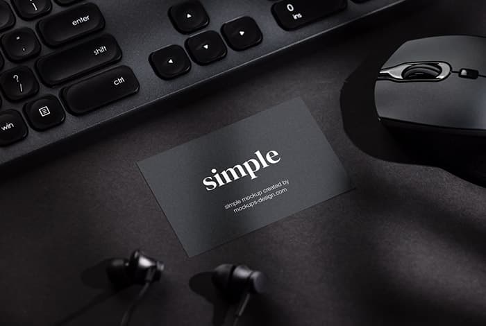Black business card on black background mockup