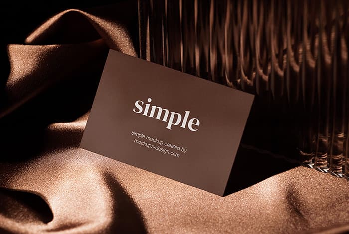 Business card on brown fabric mockup